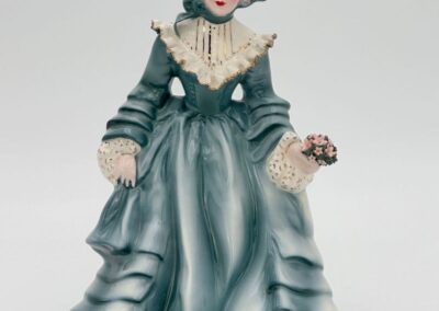 Claudia figurine from Florence Ceramics dressed in Teal gown.