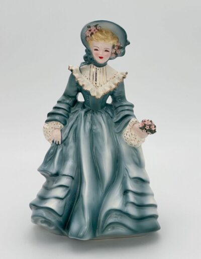 Claudia figurine from Florence Ceramics dressed in Teal gown.